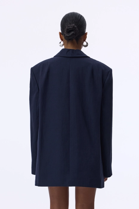 Oversized double-breasted linen blazer with shoulder pads