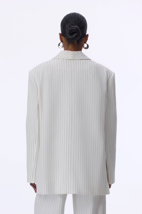 Oversized double-breasted linen blazer with shoulder pads