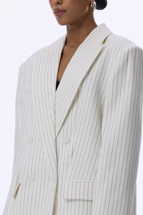Oversized double-breasted linen blazer with shoulder pads