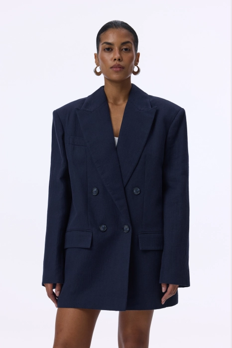 Oversized double-breasted linen blazer with shoulder pads