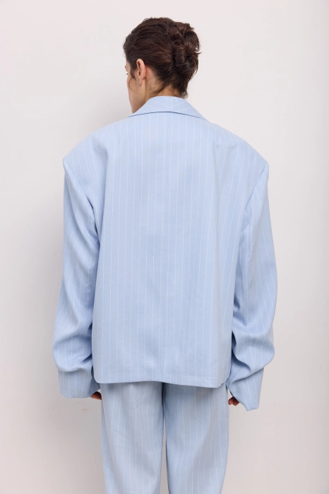 Oversized linen blazer with gathered details on the sleeves